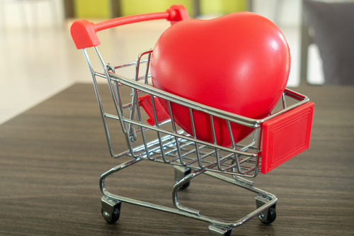 A heart in a shopping cart.